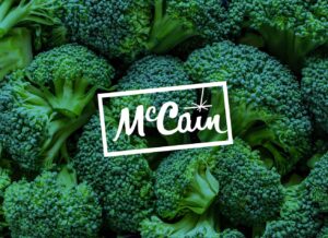 McCain logo positioned above a tray of cut broccoli