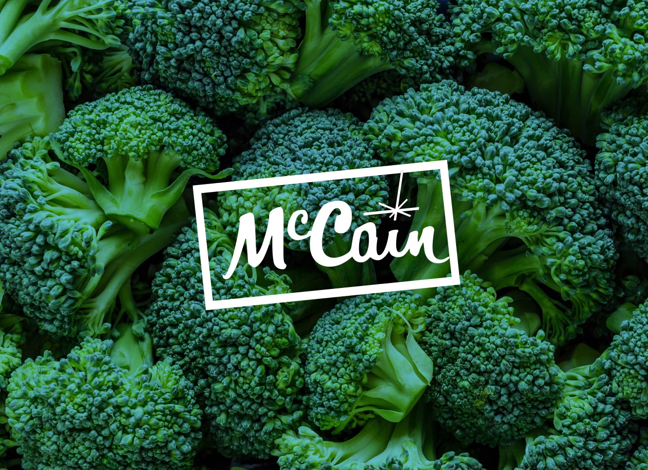 McCain logo positioned above a tray of cut broccoli